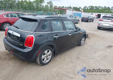 2015 Mini Hardtop Cooper from USA, damaged, VIN WMWXS5C58FT828427